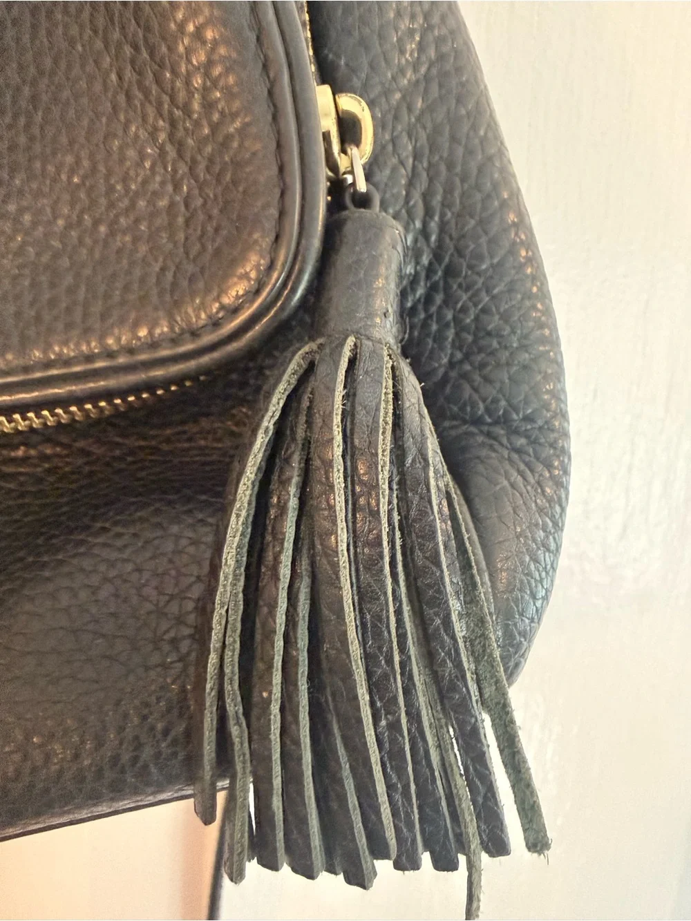 kate spade black pebbled leather shoulder bag with tassel